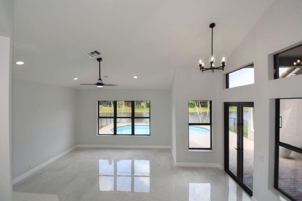 Photo of 6437 NW 108th Terrace, Parkland, FL 33076 (MLS # F10498999)