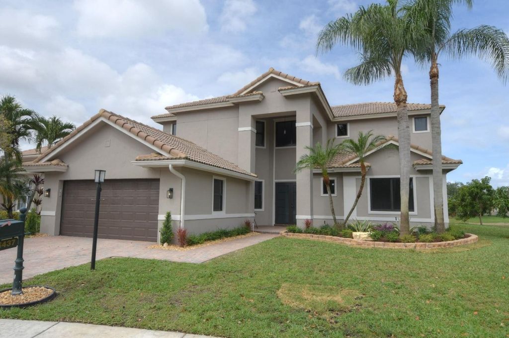 Photo of 6437 NW 108th Terrace, Parkland, FL 33076 (MLS # F10498999)