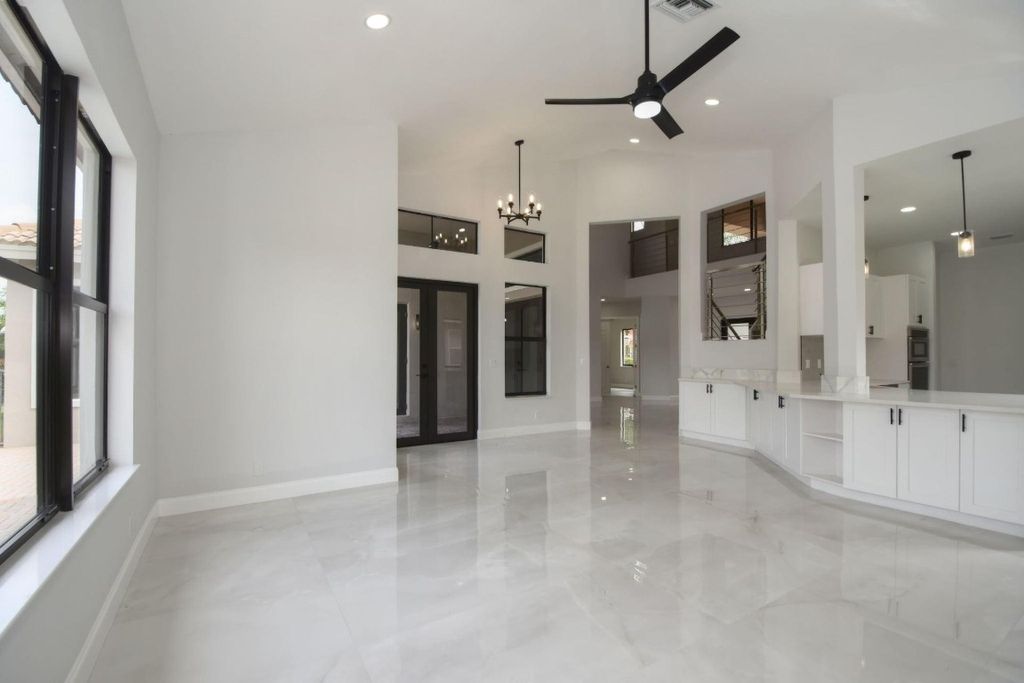 Photo of 6437 NW 108th Terrace, Parkland, FL 33076 (MLS # F10498999)