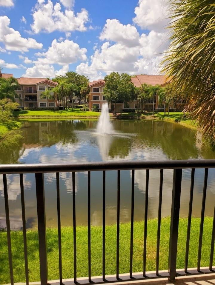 Welcome to Edgewater, a highly sought-after all-ages gated community offering the perfect blend of comfort, style, and convenience! This freshly painted and well maintained 3-bed, 2-bath lake view condo features a spacious split floor plan, good size kitchen, stainless steel appliances, and in-unit washer/dryer. The oversized primary suite boasts a large walk-in closet for maximum storage. Enjoy resort-style amenities including 2 pools, hot tubs, tennis courts, a bi-level fitness center, business center, billiard room, clubhouse, BBQ areas, playground, and even a dog park! Perfectly located near top-rated schools, shopping, restaurants, places of worship, family fun, and major highways including the Turnpike and Sawgrass Expressway. This is the lifestyle you've been waiting for!