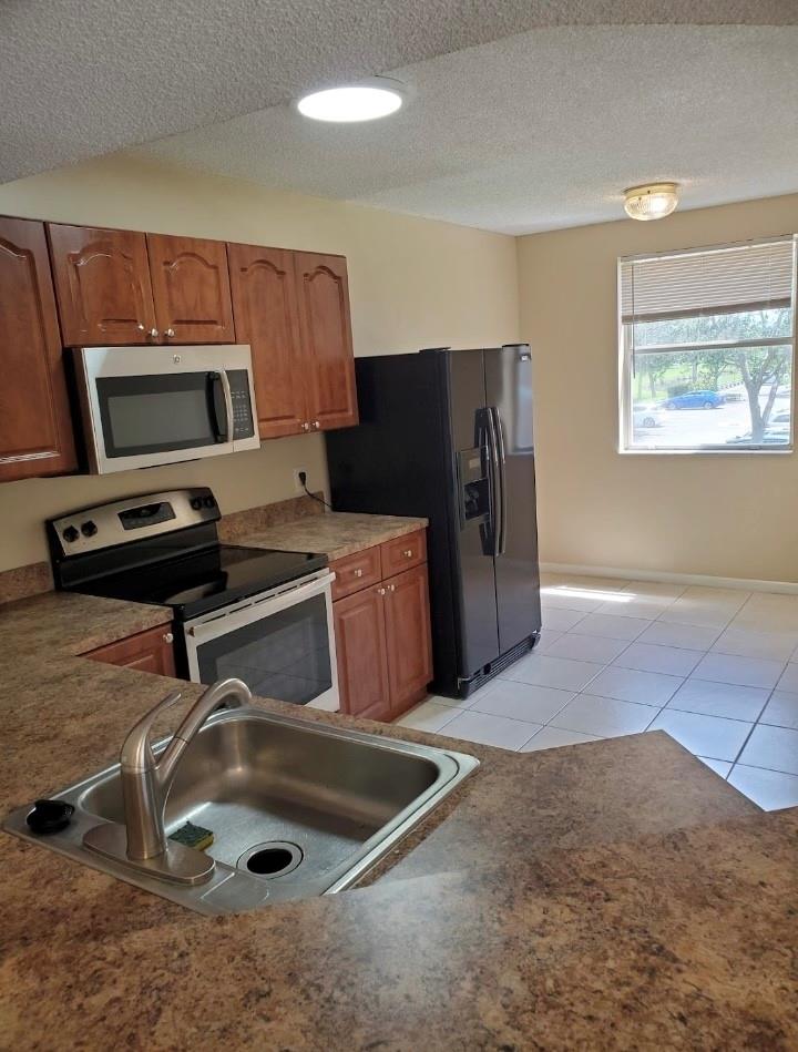 9033 Wiles Rd 202
