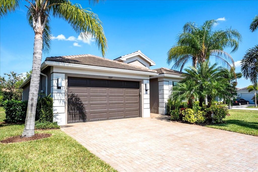 Photo of 11069 SW Carriage Hill Lane, Port Saint Lucie, FL 34987 (MLS # R10998406)