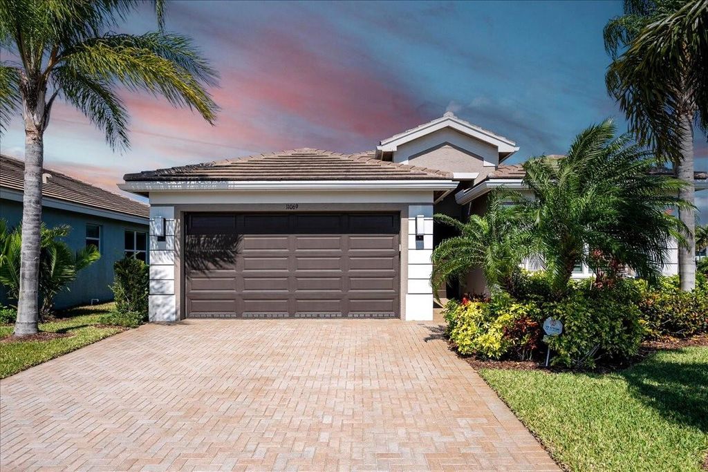 Photo of 11069 SW Carriage Hill Lane, Port Saint Lucie, FL 34987 (MLS # R10998406)