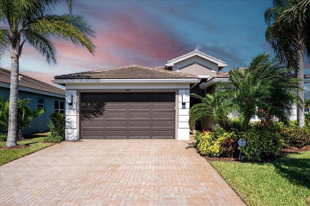 Photo of 11069 SW Carriage Hill Lane, Port Saint Lucie, FL 34987 (MLS # R10998406)