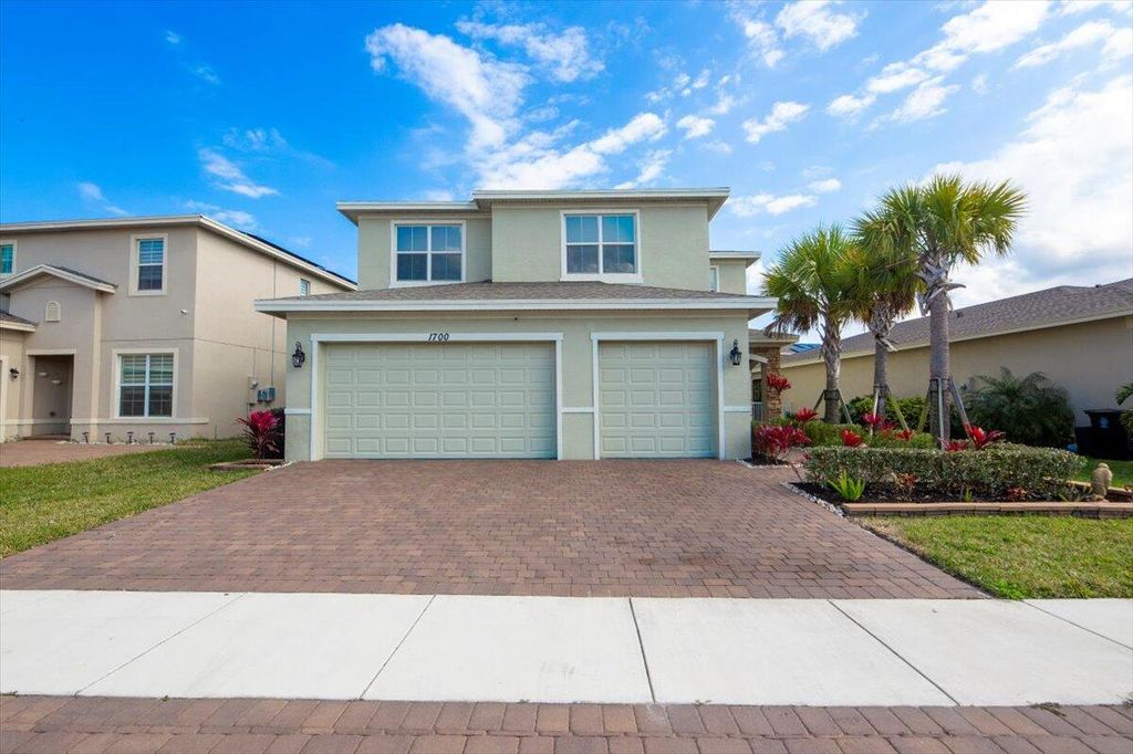 Photo of 1700 NW Vivanco Street, Port Saint Lucie, FL 34986 (MLS # R11167093)