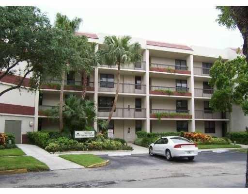 1st floor beautiful unit. diagonal Tile thru out. Stackable Washer Dryer in unit, Screened Tiled Patio. on lovely canal. Close to Broward Westfield Mall. Very quiet, centrally located, lovely water view, access to 3 community pools. Parking in front of unit.