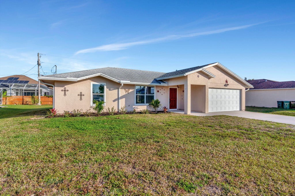 Photo of 481 SW Baoy Avenue, Port Saint Lucie, FL 34953 (MLS # R11067978)