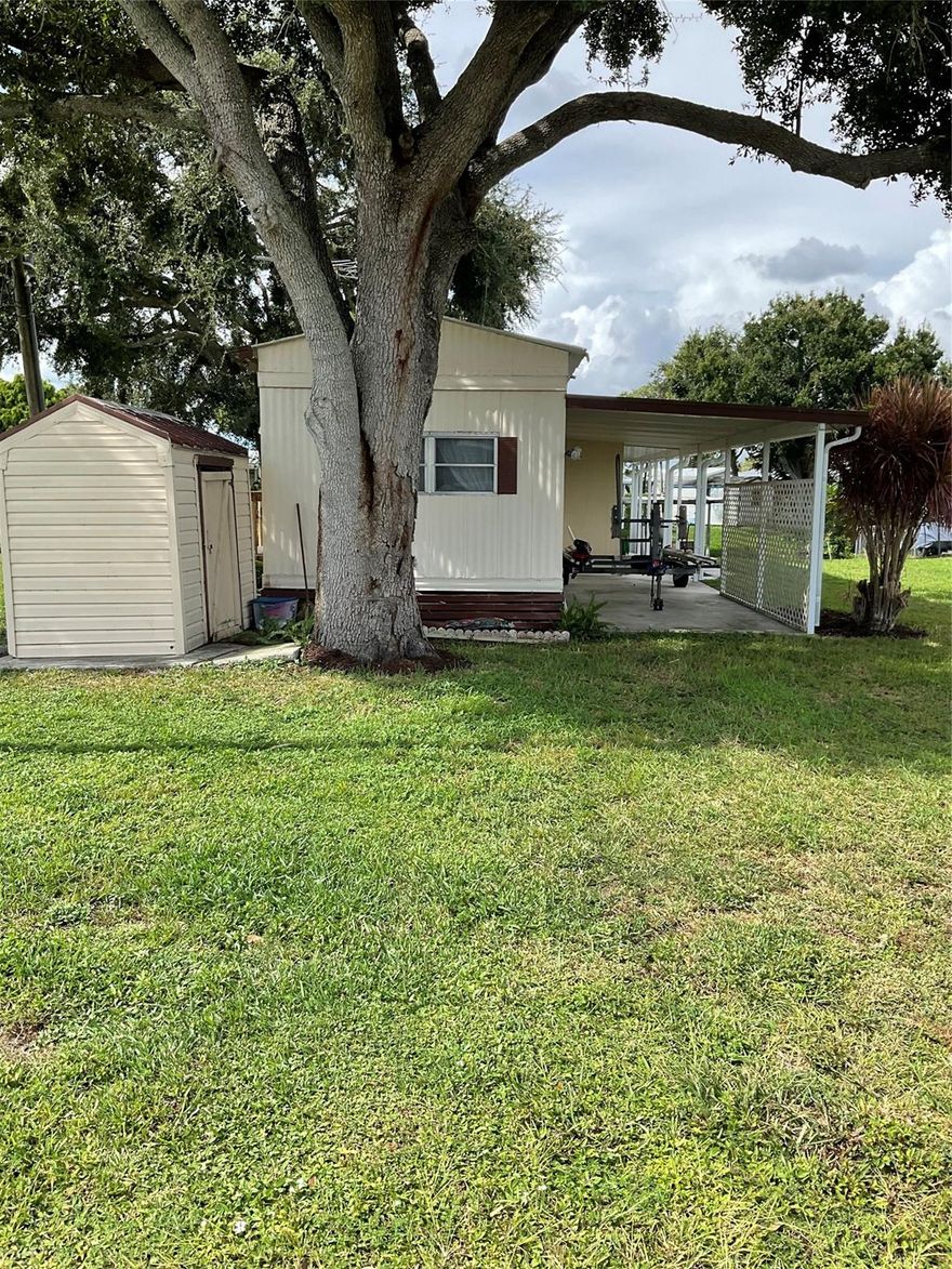 Buck Head Ridge- Lake Okeechobee Access. Attention all fishermen! Furnished 2-bedroom/ 1 bath SWMH built by Fleetwood, located on through canal just Minutes from Lake Okeechobee!  Features include, open floorplan, Laminate flooring, solid wood cabinets, solid surface countertop, 2017 Metal roof, Central Heat and Air, Covered Patio area, Good Seawall, large boat slip, sprinkler system off canal, mature landscaping.  Property needs updating, all measurements approximate. Call today for more information.