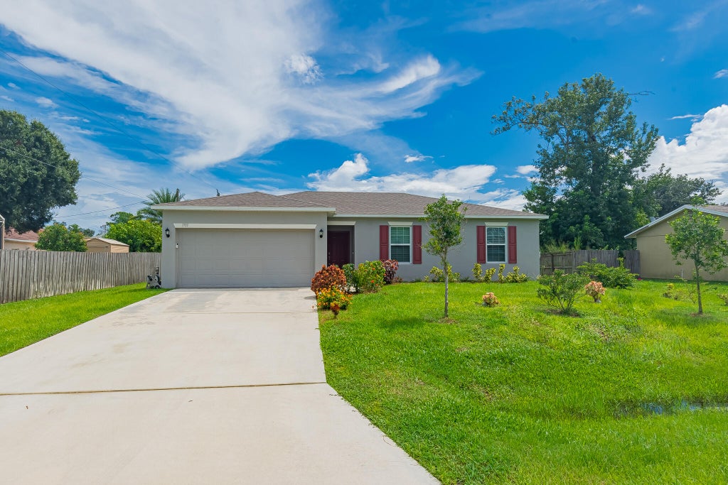 Photo of 1711 SW Angelo Street, Port Saint Lucie, FL 34953 (MLS # B26042780)