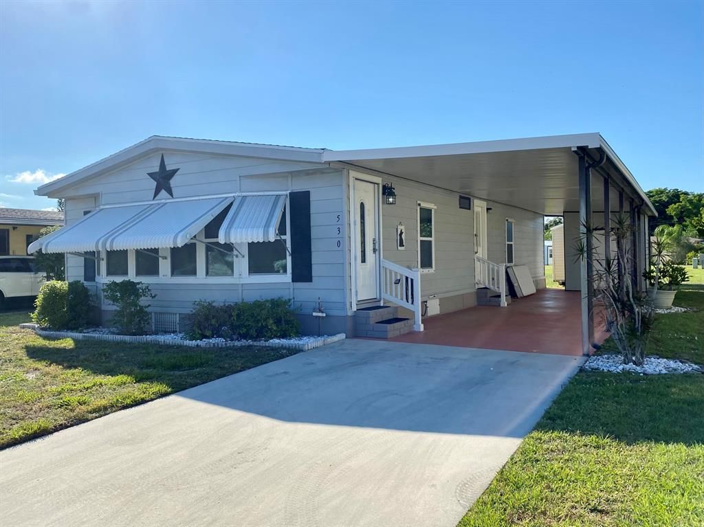 Photo of 530 Ann Marie Lane, Port Saint Lucie, FL 34952 (MLS # R10714899)