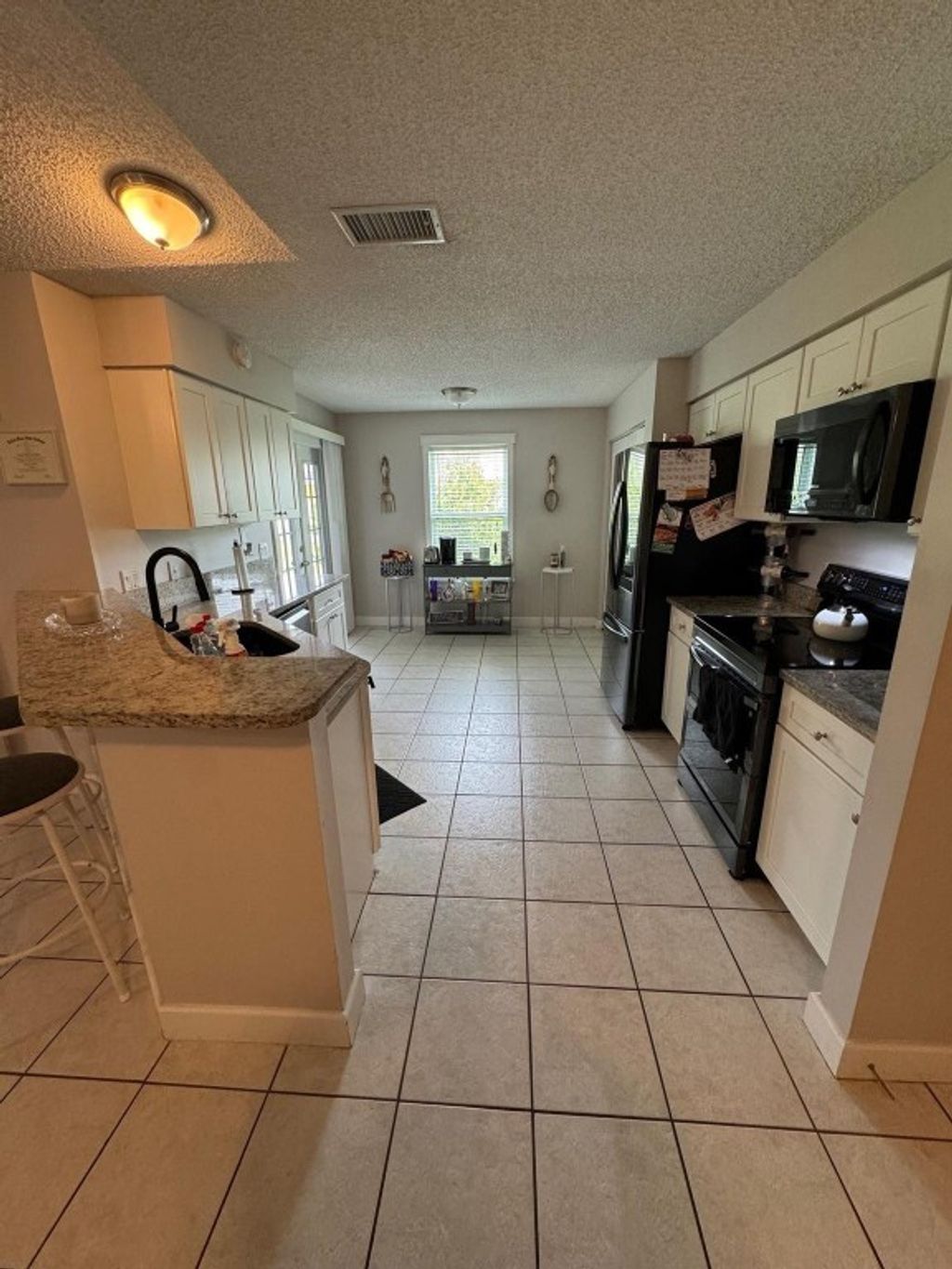 Photo of 3621 SW Rosser Boulevard, Port Saint Lucie, FL 34953 (MLS # F10462637)