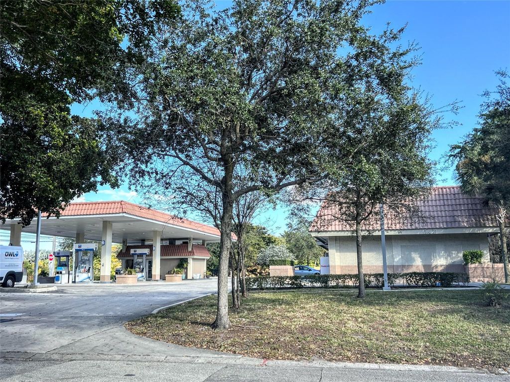 Photo of 7380 Wiles Road, Coral Springs, FL 33067 (MLS # F10541882)