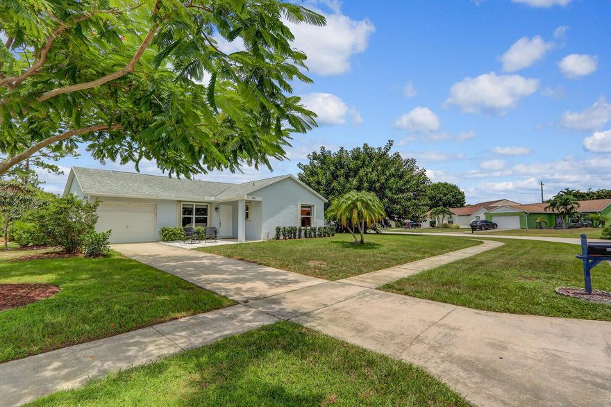 This is your chance to live in the beautiful city of Jupiter Florida!  This 3-bedroom, 2 bath home on a large corner lot has a one car garage. Beautifully updated with newer roof, newer ac, new interior doors, outlets and covers, new tile and fresh paint throughout. Kitchen has deep stainless sink, granite countertops. Accordion shutters on all windows. Located close to beaches, parks, shopping, restaurants and world class golf.  A-rated schools district and a community pool make this home a rare find.  Investors note: no restrictions on short term rentals.