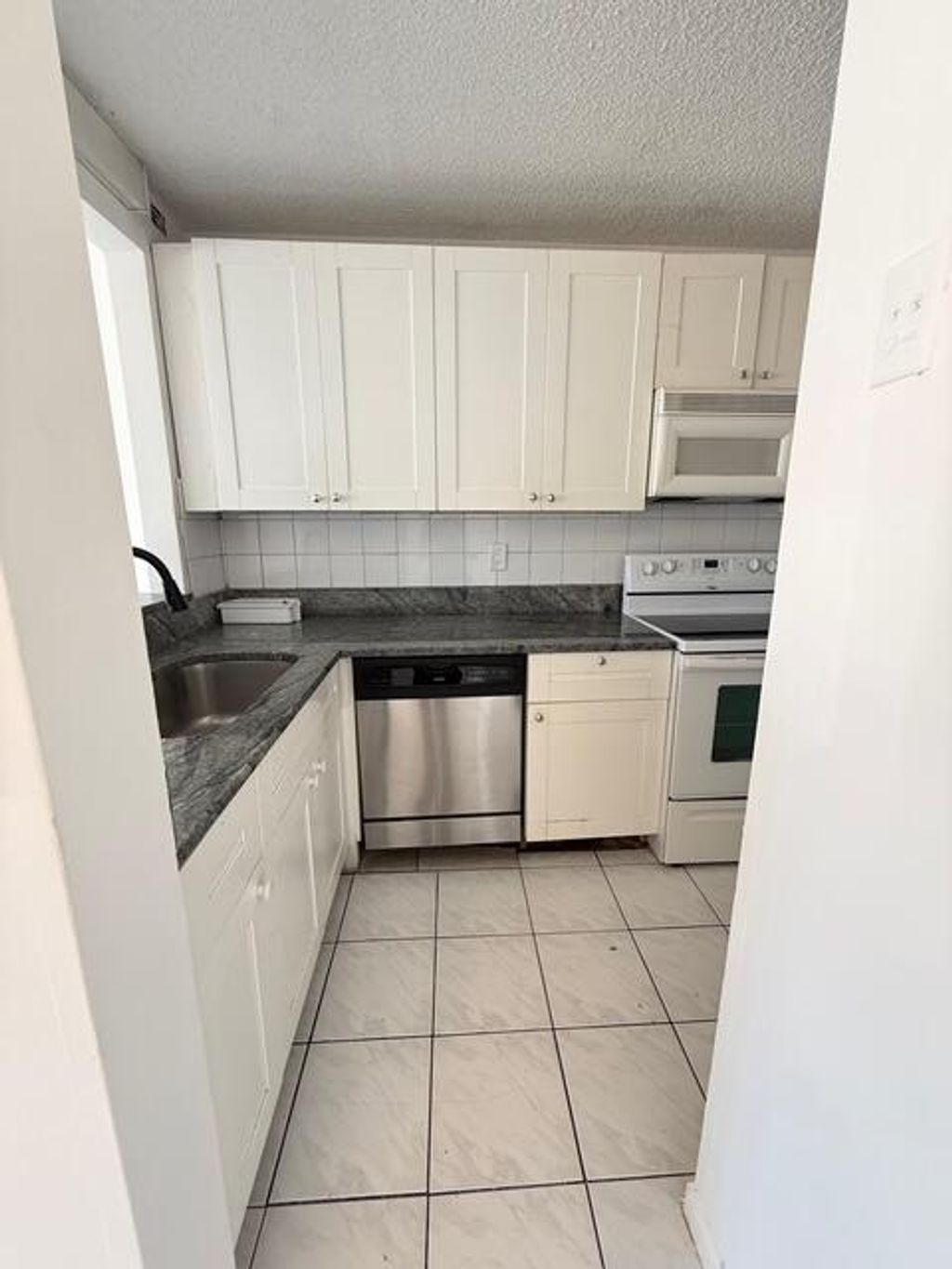 Photo of 1003 Twin Lakes Drive #29-c, Coral Springs, FL 33071 (MLS # B26018304)