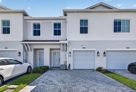 Photo of 608 NE WATERS EDGE Lane, Port Saint Lucie, FL 34983 (MLS # B26053387)