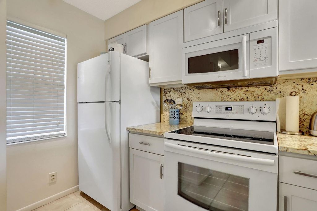 Photo of 2230 N Cypress Bend Drive #306, Pompano Beach, FL 33069 (MLS # F10520054)