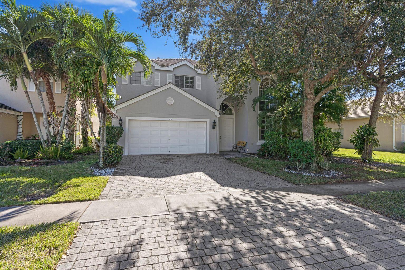 Victoria Groves is a guard gated community centrally located with a Publix shopping center that can be accessed without going on the main roads that are the entrance to the community. Palm Beach International and the beaches are a 15 minute drive, Costco, Whole Foods, Trader Joes, and numerous restaurants are not too far away, Victoria Grove has a gazebo facing a beautiful lake, and the bike rack is there to accommodate the many bikes which becomes the preferred mode of transportation to travel to the pool, tennis courts, tot lot ,fitness center, hockey rink, and soccer field. Travel a little west, and you will arrive at Lion Country Safari which is a world class amusement park. There are rides for all ages The kids love the raised platform that allows feeding the giraffes.