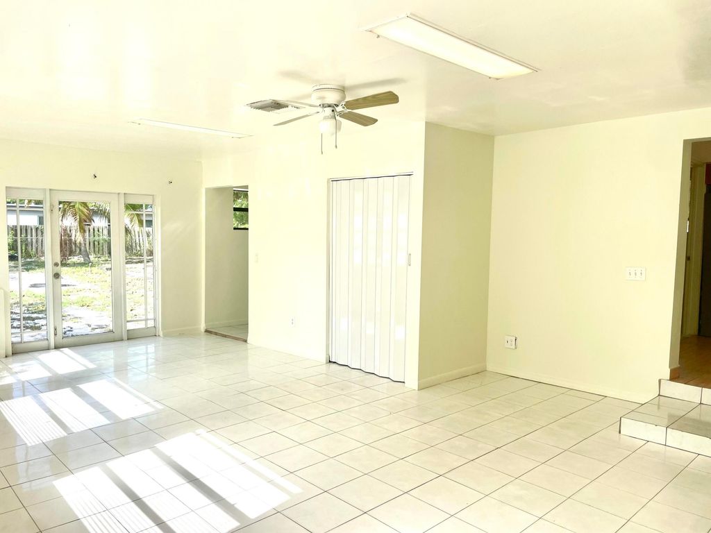 Photo of 1229 19th Avenue N, Lake Worth Beach, FL 33460 (MLS # R11098054)
