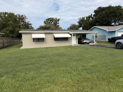 Photo of 5550 SE NORMANDY Avenue, Stuart, FL 34997 (MLS # B26076947)