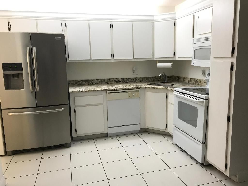 Photo of 203 Foxtail Drive #C2, Greenacres, FL 33415 (MLS # R11153068)