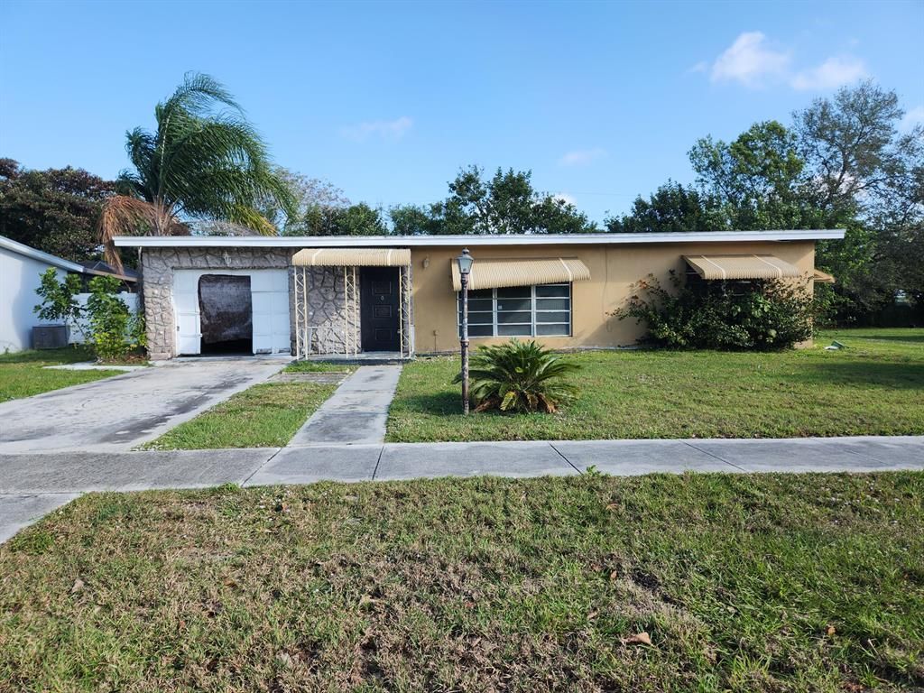 Photo of 125 SE Lucero Drive, Port Saint Lucie, FL 34983 (MLS # R10867394)
