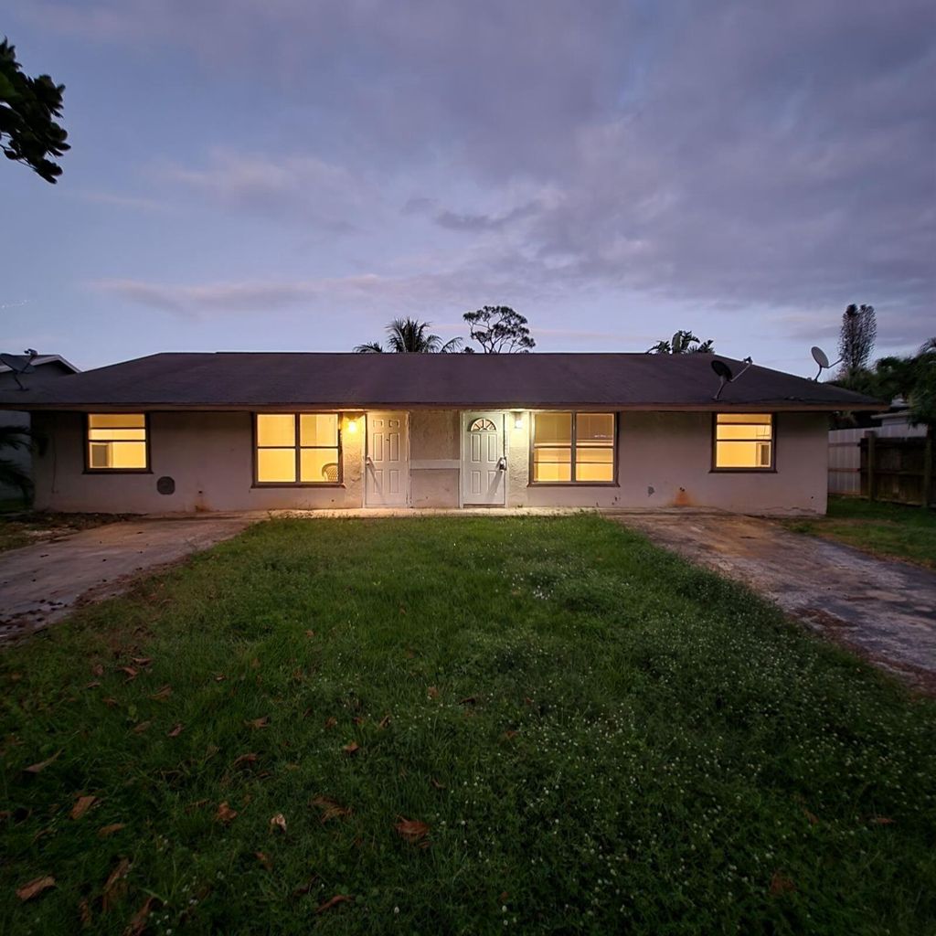 Photo of 4851 SE Flounder Avenue, Stuart, FL 33455 (MLS # R10851223)