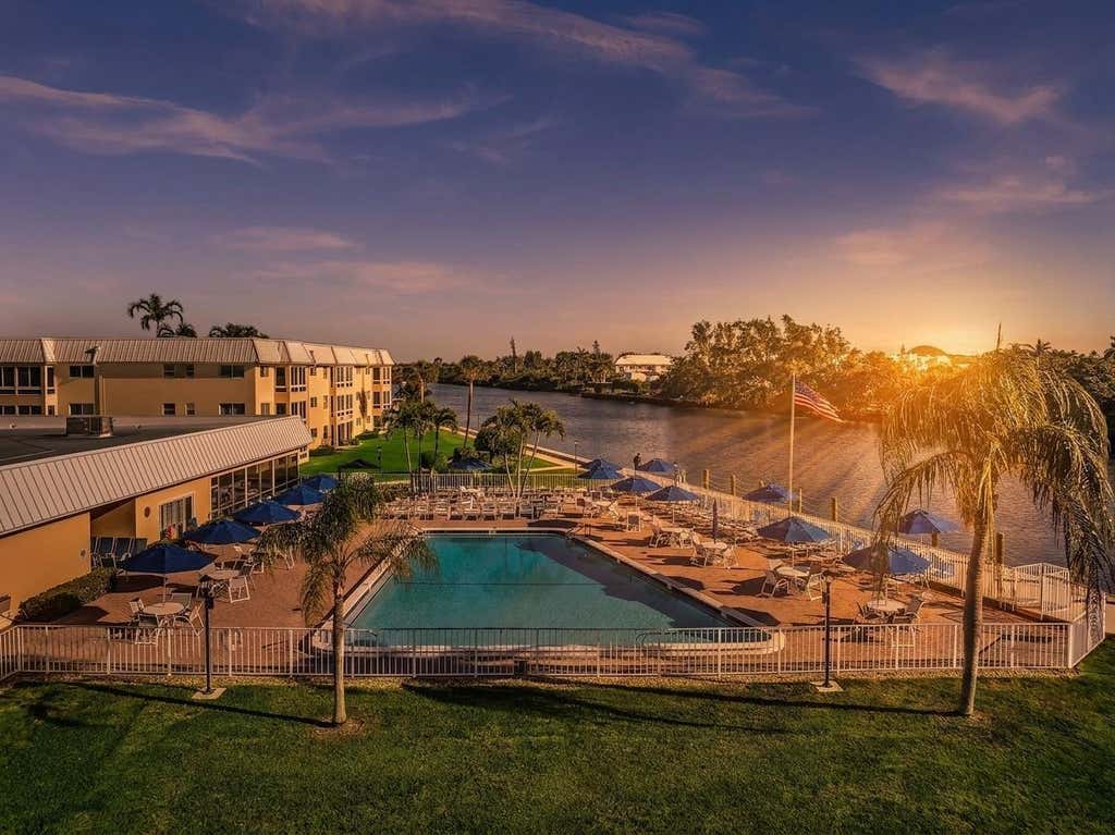Photo of 14 Colonial Club Drive #300, Boynton Beach, FL 33435 (MLS # B26059720)