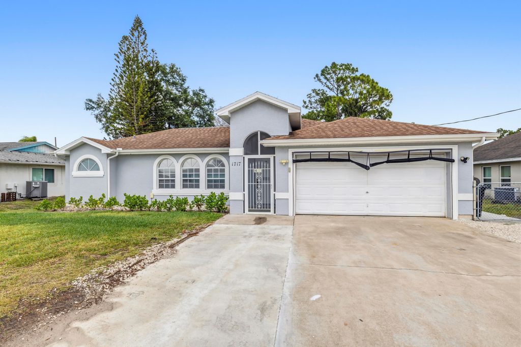 Photo of 1717 SW Burlington Street, Port Saint Lucie, FL 34984 (MLS # B26021720)