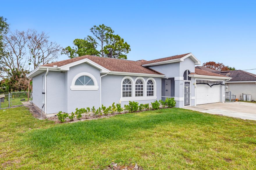 Beautifully updated home with an open-concept layout and a completely renovated kitchen featuring all stainless steel appliances. Enjoy luxury vinyl flooring throughout and a versatile den/office that can easily serve as a 4th bedroom. The enclosed, screened patio is perfect for relaxing or entertaining, overlooking a spacious fenced backyard filled with fruit trees. The fully concreted exterior offers ample parking for up to 6 vehicles. A move-in ready property with comfort, style, and plenty of space inside and out.