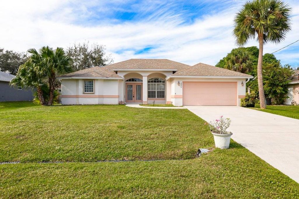 Photo of 2270 SW Tampico Street, Port Saint Lucie, FL 34953 (MLS # R11125122)