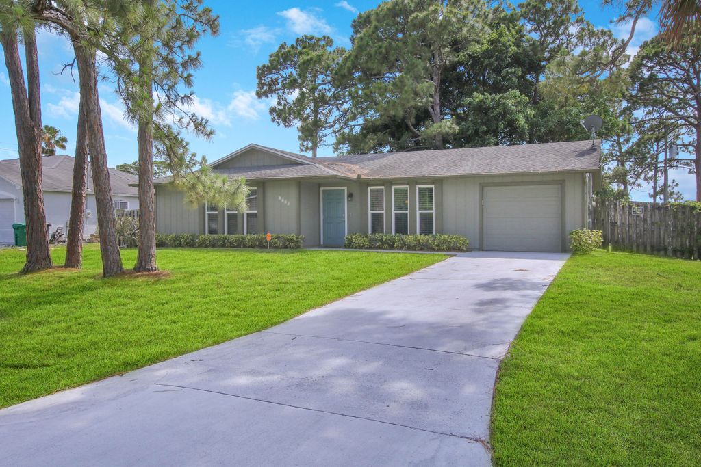 Photo of 1474 SE Barker Lane, Port Saint Lucie, FL 34983 (MLS # R10799518)