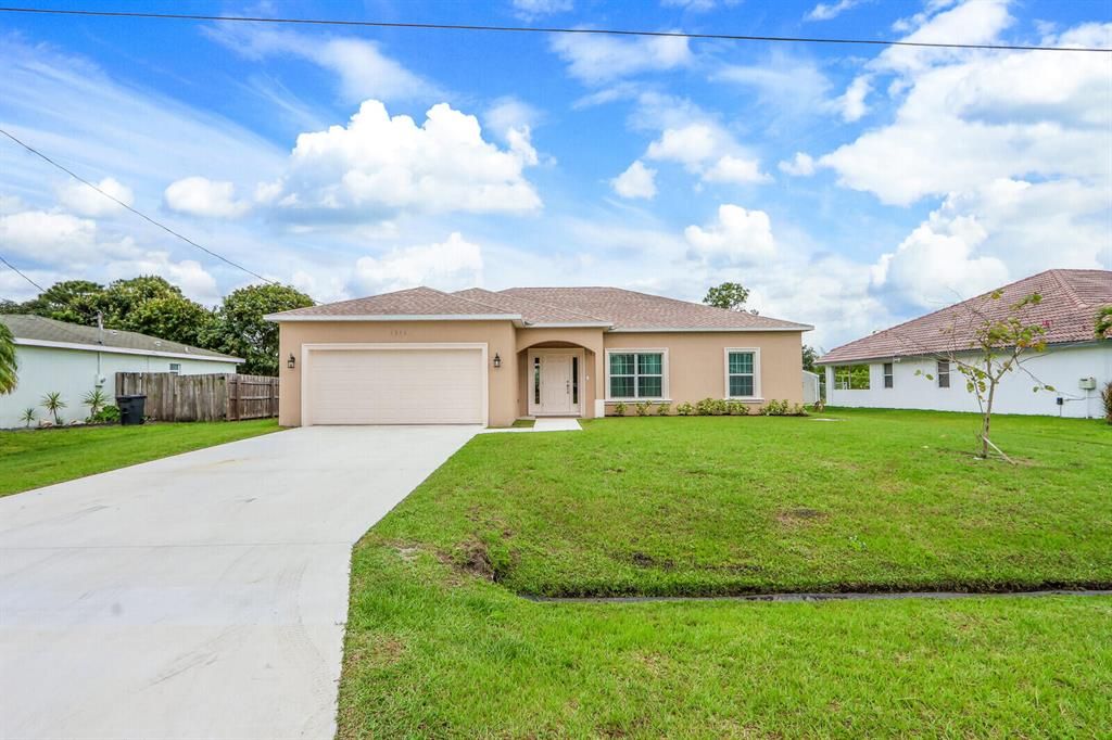 Photo of 1356 SW Adcock Avenue, Port St Lucie, FL 34953 (MLS # R10882346)