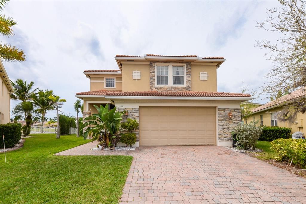 Photo of 2335 NW Via Della Court, Port Saint Lucie, FL 34986 (MLS # R10783602)