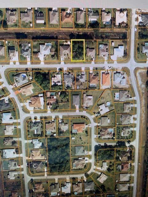 Photo of 2225 SW Gray Beal Avenue, Port Saint Lucie, FL 34953 (MLS # R11101602)
