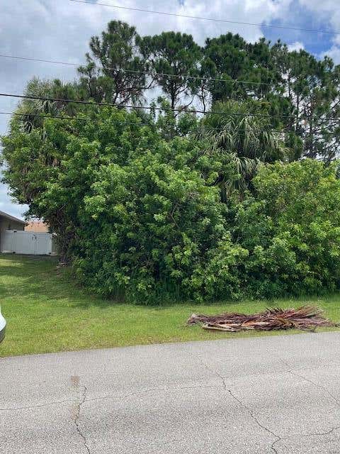 Photo of 2225 SW Gray Beal Avenue, Port Saint Lucie, FL 34953 (MLS # R11101602)