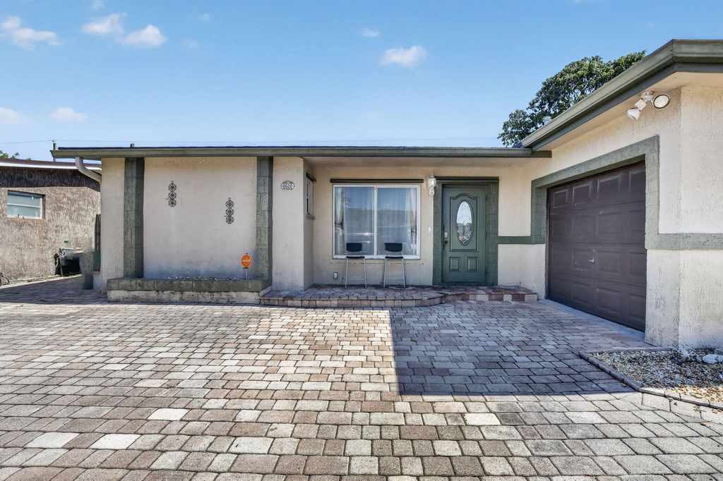 Photo of 8600 NW 29th Street, Sunrise, FL 33322 (MLS # B26025822)