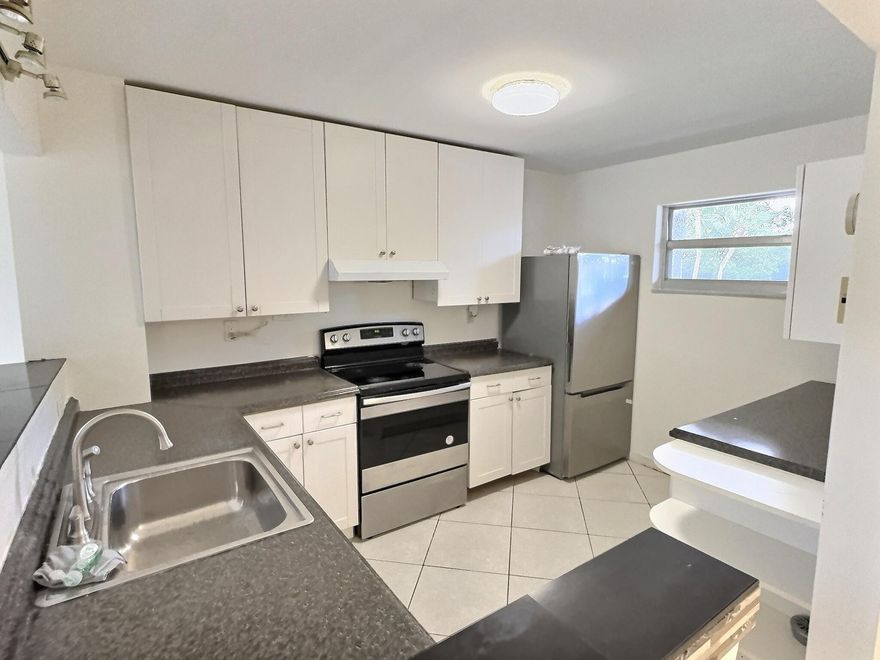 Discover this Oversized 2 bed 2 bath corner unit perfectly situated in the heart of Coral Springs. The open floor plan offers a seamless flow between the bright living room and the updated kitchen, ideal for both relaxing and entertaining. Enjoy your morning coffee in the screened-in patio overlooking the pool. This unit features a split floorpan with two large bedrooms—including a walk-in closet in the Master and a second bedroom with a custom built-out closet. The community is very well maintained with a community pool and tennis courts. It is conveniently located near top-rated schools, shopping, the mall, and an abundance of restaurants—this is the perfect place to call home.