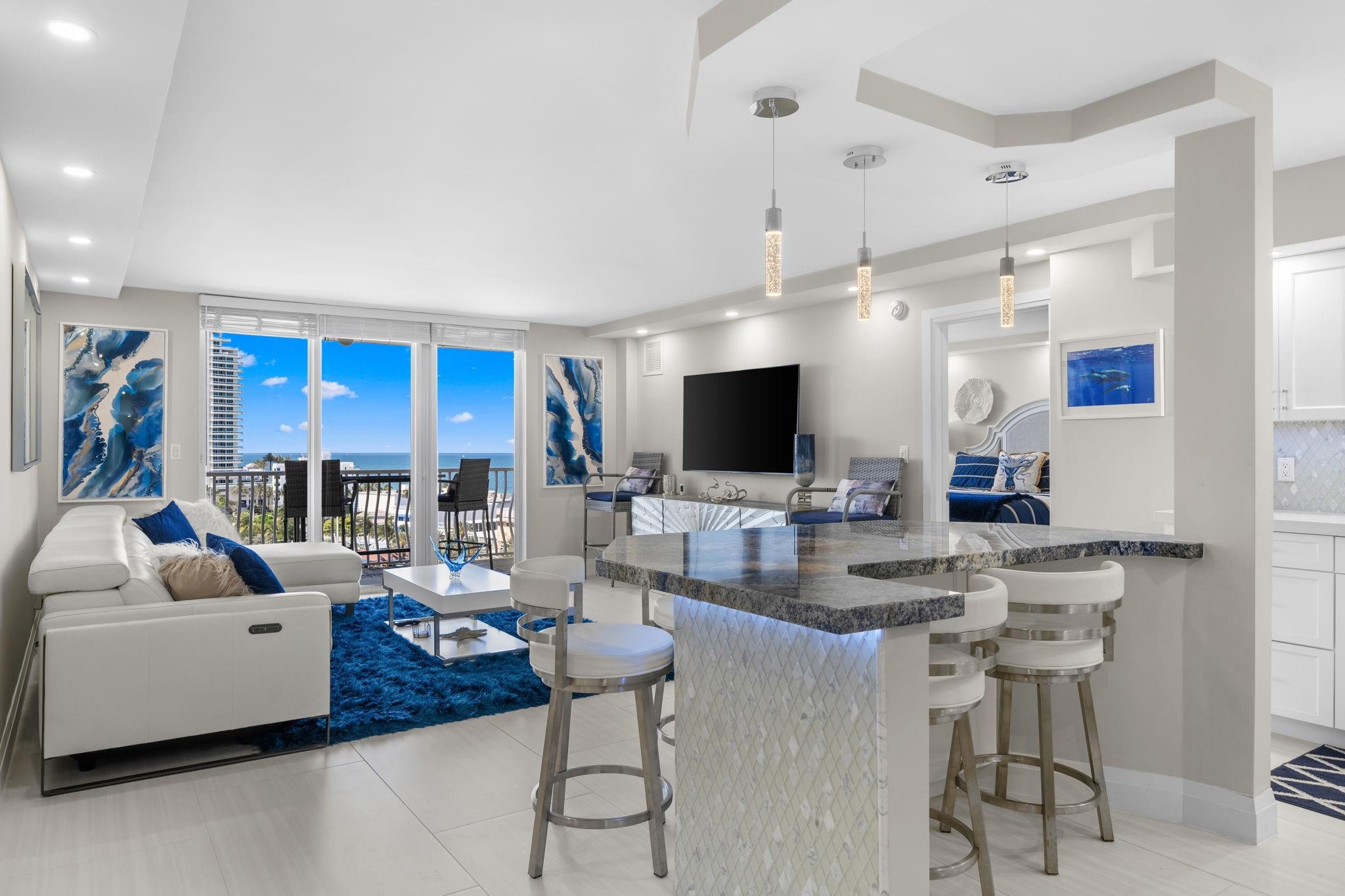 Completely Renovated & Fully Furnished OFF SEASON Rental with Direct Ocean Views! Right on Las Olas in Ft. Lauderdale Beach, this 2Bed/2Bath condo is in Pristine Condition with modern furnishings. Enjoy Sunrises over the Ocean, Fine Dining on the Water & Tranquil Evenings with Intracoastal & Ocean Views. Newly Renovated, features include a modern Kitchen with Bright White Cabinetry, Large Island with seating for 6, Tile floors throughout, Large Primary suite with King Size Bed, Custom Closets & Remodeled Bath featuring Glass Walk-In Shower, Guest Suite with 2 Queen Beds & remodeled bath. This is a perfect Beach location with the close proximity of downtown! Washer Dryer in the Unit & Storage Cage available. Amazing Pool Deck right on the Intracoastal! This gated Community offers so much!