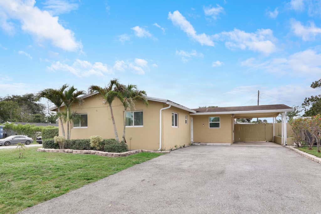 Photo of 827 Caroline Avenue, West Palm Beach, FL 33413 (MLS # B26052692)