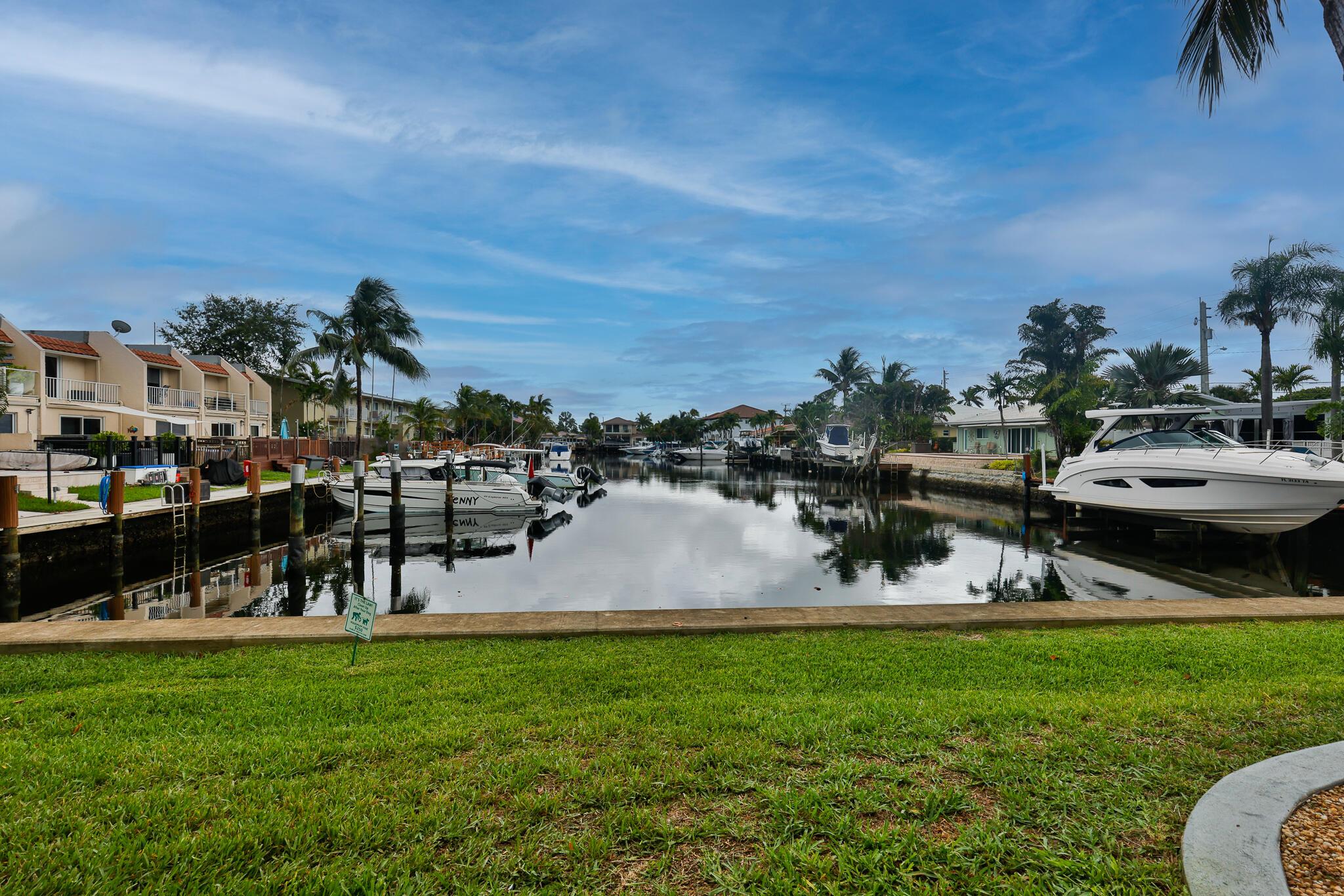 For rent now - beautiful 1 bedroom / 1 bathroom 2nd floor corner condo in the sought-after community of Cypress Cove, East Pompano Beach. Live on the water from your living room, bright tile floors to the entire residence, and hurricane impact windows so you can rest easy. 2 pools are offered at Cypress Cove as well as on-site washer/dryers and pet-friendly living. Parking is assigned. Rent includes water/sewer/trash. Vacant and available to move in quickly - come and get it while it's available!