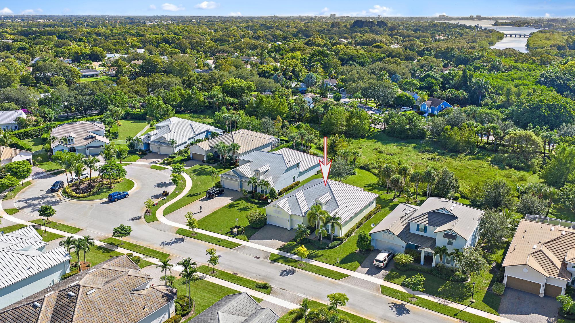 Annual, unfurnished, available now after HOA approval - Shores Pointe, Jupiter. Beautifully maintained 3 Bedroom plus den/flex room, 3 Bathroom, 3 Car Garage home located in the highly desirable community of Shores Pointe in the heart of Jupiter. Soaring ceilings, an open layout, new carpets, 2016 construction. The versatile den/flex room is ideal for a home office, playroom, or guest space. The kitchen is designed for both function and style, featuring white cabinetry, granite countertops, a large island, a walk-in pantry and brand new stainless steel appliances including a gas range. Peace of mind and easy living with full impact windows and doors, CBS construction and metal roof. Includes landscaping, pest control, association fees, common area playground. Zoned for A rated schools!