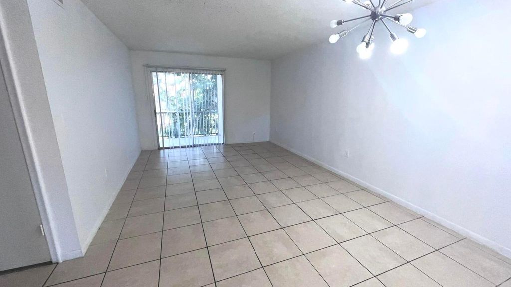 Photo of 6080 Forest Hill Boulevard #206, West Palm Beach, FL 33415 (MLS # R11150410)