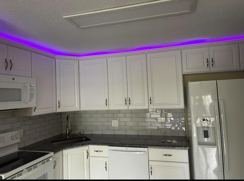 Photo of 205 Foxtail Drive #D3, Greenacres, FL 33415 (MLS # R11115497)