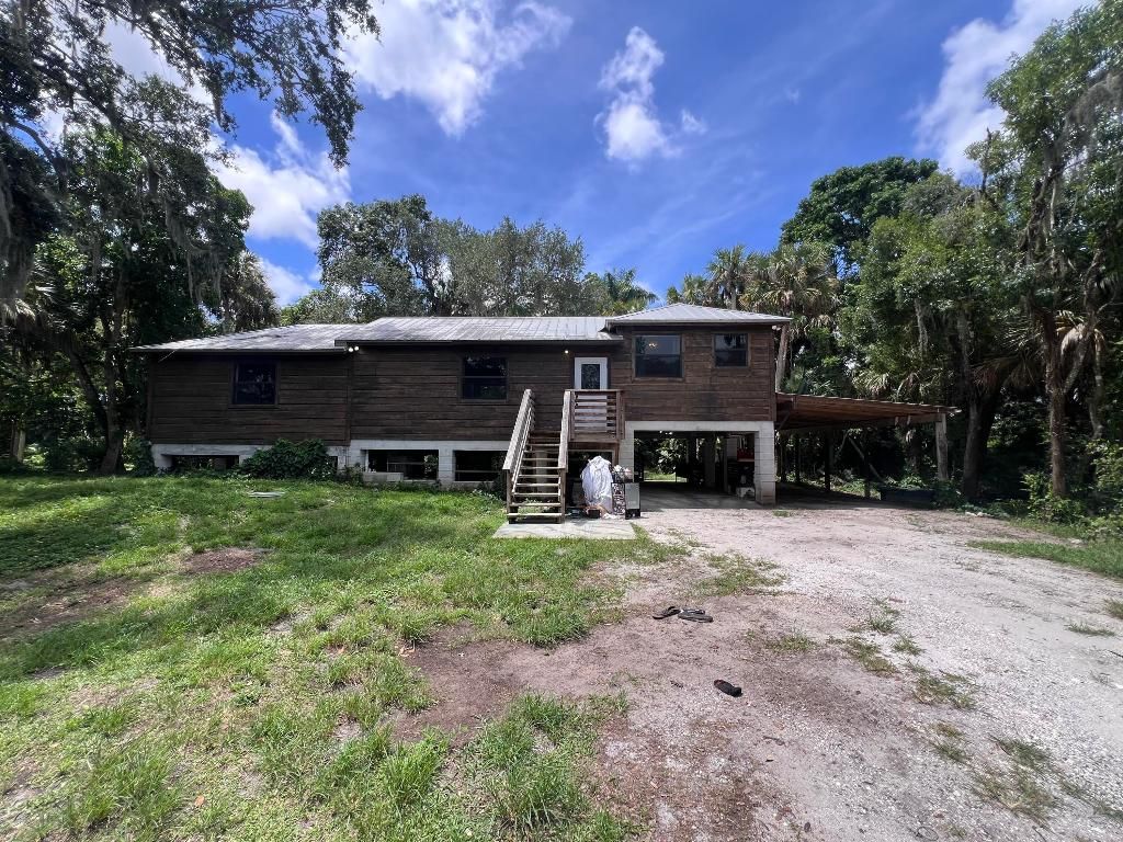 Photo of 1756 SW Ranch Trail, Stuart, FL 34997 (MLS # R10997309)