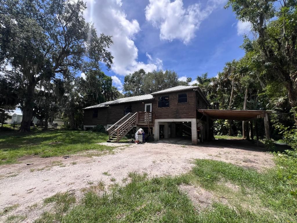 Photo of 1756 SW Ranch Trail, Stuart, FL 34997 (MLS # R10997309)