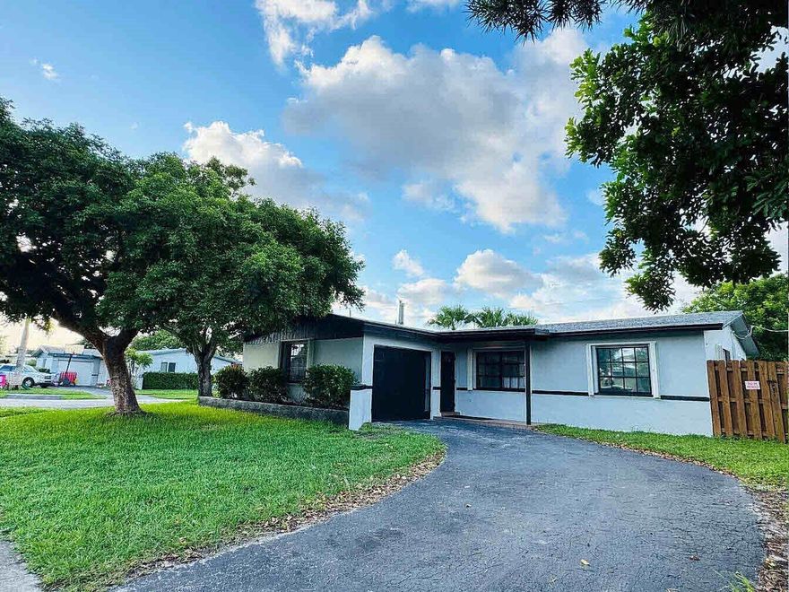 Elevate your living experience with this exceptional rental opportunity in West Sunrise! This upgraded single-family home offers 4 spacious bedrooms, 2 modern bathrooms, and a 1-car garage on a desirable corner lot. The large, fully fenced yard features an 8-foot gate, perfect for storing a trailer, jet ski, or small boat. Inside, the home is move-in ready with recent AC, appliances, and water heater. The updated kitchen, bathrooms, recent flooring, and fresh paint inside and out provide a modern touch. Each room has ceiling fans, and a washer and dryer are included. Centrally located, you’ll have easy access to all Broward County offers within 20 minutes or less. Don’t miss this opportunity to lease a beautiful home in a prime location! Available for occupancy November 8, 2025.