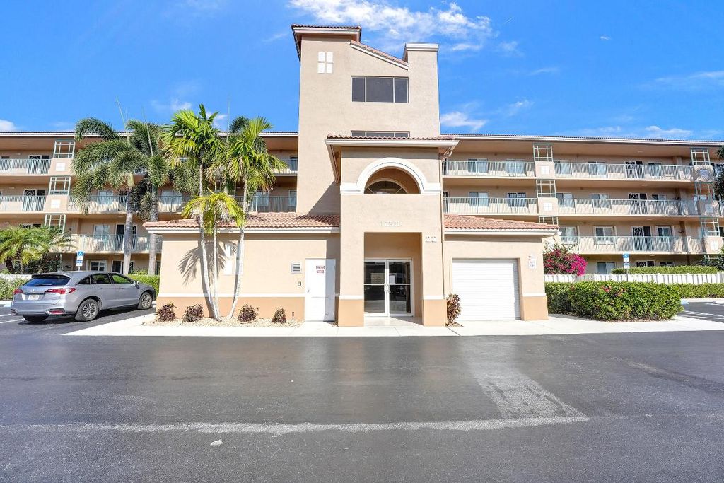 Photo of 12511 Imperial Isle Drive #102, Boynton Beach, FL 33437 (MLS # R10990458)