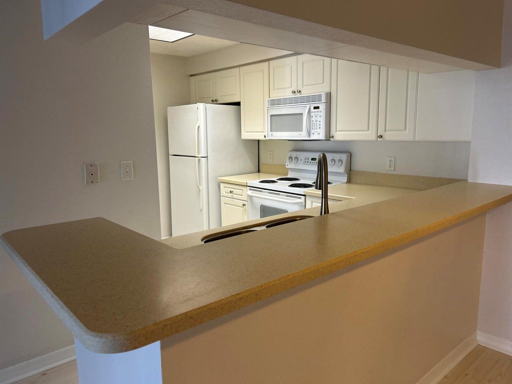 Photo of 3021 Alcazar Place #204, Palm Beach Gardens, FL 33410 (MLS # R11136732)