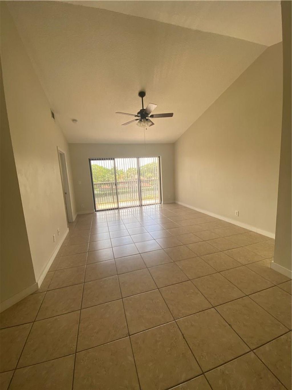 Photo of 5701 Riverside Drive #303, Pompano Beach, FL 33067 (MLS # F10434408)