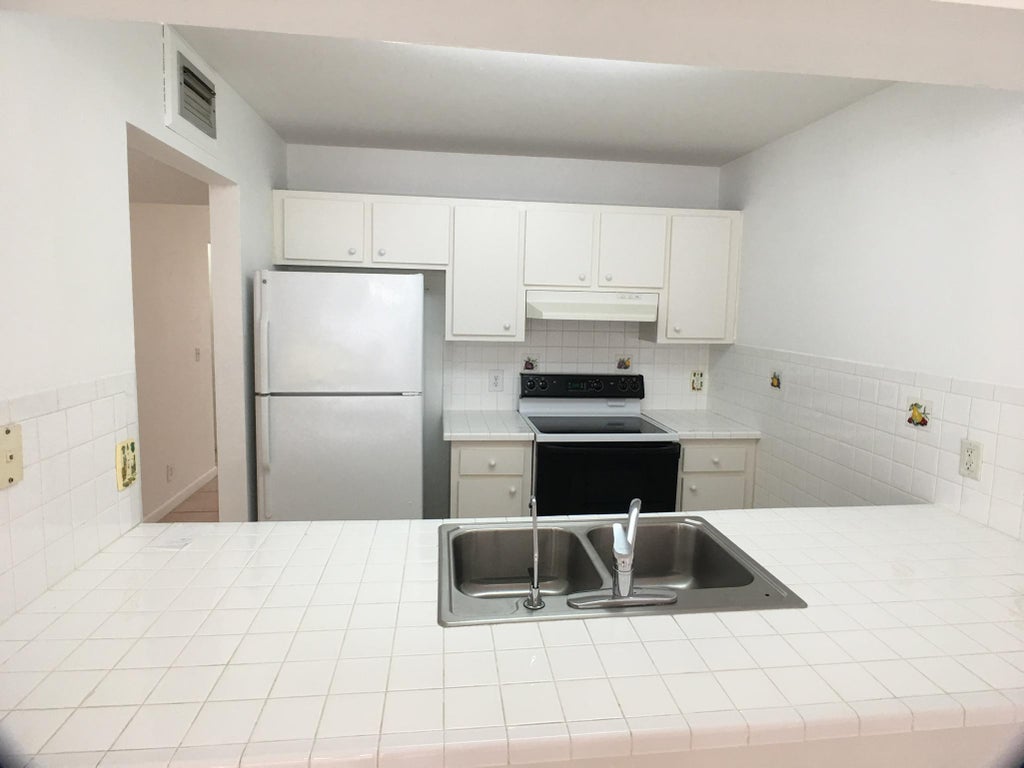 Photo of 5852 Albert Road, West Palm Beach, FL 33415 (MLS # B26054829)